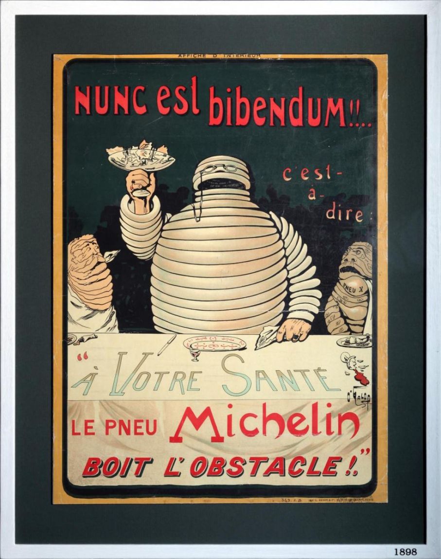 "Nunc est Bibendum" är latin för "tid att dricka" och användes för att attrahera den målgrupp som då hade råd att äga egen bil - överklassen som rökte cigarr och hade monokel.